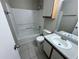 Cozy bathroom showcasing a vanity with integrated sink and shower-tub combination at 629 Dory Ln # 202, Altamonte Springs, FL 32714