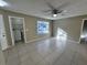 Bedroom featuring a ceiling fan, closet, and natural light from the window at 629 Dory Ln # 202, Altamonte Springs, FL 32714