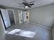 Bedroom with open bathroom and walk-in closet entrances, and tile floor at 629 Dory Ln # 202, Altamonte Springs, FL 32714