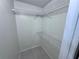 Empty walk-in closet with wire shelving for optimal storage and organization at 629 Dory Ln # 202, Altamonte Springs, FL 32714