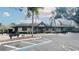 The community clubhouse features a covered entry, ample parking, and a well-maintained lawn at 629 Dory Ln # 202, Altamonte Springs, FL 32714