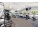 Well-equipped fitness center with machines, weights, and mirrors for a complete workout experience at 629 Dory Ln # 202, Altamonte Springs, FL 32714