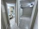 Open view of the bathroom and bedroom with tiled floors, creating a cohesive living space at 629 Dory Ln # 202, Altamonte Springs, FL 32714