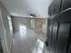 Living room showcasing the tile flooring, ceiling fan, and open layout at 629 Dory Ln # 202, Altamonte Springs, FL 32714