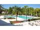 Community pool and lounge area features ample seating, mature landscaping and a secure perimeter fence at 629 Dory Ln # 202, Altamonte Springs, FL 32714