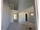 Spacious living room showing open floor plan, high ceilings, and abundant natural light at 726 Pointe Emerson Blvd, Apopka, FL 32703