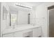 Spacious bathroom featuring double sinks, a vanity and a large mirror, ideal for modern living at 940 Douglas Ave # 132, Altamonte Springs, FL 32714