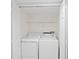 A functional laundry closet with a washer and dryer set for convenience at 940 Douglas Ave # 132, Altamonte Springs, FL 32714