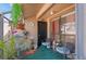 Cozy patio, decorated with plants, and features comfortable seating for relaxation and outdoor enjoyment at 940 Douglas Ave # 132, Altamonte Springs, FL 32714