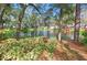 Scenic view of a pond with a fountain, surrounded by lush landscaping at 940 Douglas Ave # 132, Altamonte Springs, FL 32714