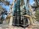 A modern building with unique glass detailing and street-side appeal at 101 S Eola Dr # 1009, Orlando, FL 32801