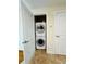 Convenient stackable washer and dryer unit in dedicated laundry area at 101 S Eola Dr # 1009, Orlando, FL 32801