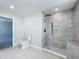 Bathroom featuring a toilet and walk-in shower with stylish black fixtures at 1040 Waverly Dr, Longwood, FL 32750