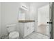 A well-lit bathroom featuring a dual-sink vanity with granite countertop at 11136 Einbender Rd, Orlando, FL 32825