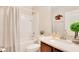 Bathroom with shower-tub combo and granite-topped vanity at 114 Alexandria Cir, Deland, FL 32724