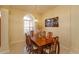 Formal dining room with elegant table setting and decorative light fixture, perfect for entertaining at 11554 Blackmoor Dr, Orlando, FL 32837