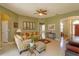 Inviting living room featuring cozy furniture, decorative accents, and seamless flow into adjacent spaces at 11554 Blackmoor Dr, Orlando, FL 32837