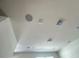 Modern ceiling with recessed lighting, a vent and surround sound speakers at 14388 Orchild Island Dr, Orlando, FL 32827