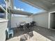 Outdoor patio area with modern table perfect for outdoor dining at 14388 Orchild Island Dr, Orlando, FL 32827