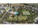 Community amenities including a pool, tennis courts, playground, and green spaces at 15574 Murcott Blossom Blvd, Winter Garden, FL 34787