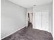 Neutral bedroom with a closet and carpeted floor at 15574 Murcott Blossom Blvd, Winter Garden, FL 34787