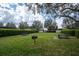 Community picnic area featuring a barbecue grill and picnic tables for outdoor dining at 15574 Murcott Blossom Blvd, Winter Garden, FL 34787