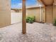 Private backyard patio with brick pavers and a white fence at 15574 Murcott Blossom Blvd, Winter Garden, FL 34787