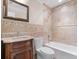 Elegant bathroom with tile surround, a shower/tub combo, and a marble vanity at 1690 Oneco Ave, Winter Park, FL 32789