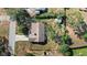 Aerial view of home with a large, fenced backyard and storage shed at 17445 Hillside Dr, Montverde, FL 34756