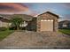 Charming single-Gathering home featuring a paver driveway and a stone-accented garage at 1821 Christina Lee Ln, St Cloud, FL 34769