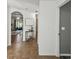 Inviting hallway with neutral colors and tile flooring leading into the living room at 1821 Christina Lee Ln, St Cloud, FL 34769