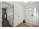 Bright entryway with white doors and tile flooring at 1821 Christina Lee Ln, St Cloud, FL 34769