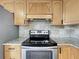 Kitchen featuring stainless steel appliances, granite countertops, and light wood cabinets at 1970 Larkwood Dr, Apopka, FL 32703