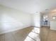 Living room featuring tiled floors and natural light with connected bath at 1970 Larkwood Dr, Apopka, FL 32703