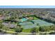 Community aerial showcasing the pool, tennis and basketball courts, playground and lush landscaping at 2137 Blackjack Oak St, Ocoee, FL 34761