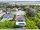 Aerial view of the home in a cul-de-sac with a private pool surrounded by lush landscaping at 2137 Blackjack Oak St, Ocoee, FL 34761