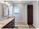 This bathroom showcases a stylish vanity, walk-in shower, and elegant finishes, creating a spa-like retreat at 2137 Blackjack Oak St, Ocoee, FL 34761