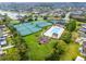 Aerial view of community pool, playground, and tennis and basketball courts in a residential neighborhood at 2137 Blackjack Oak St, Ocoee, FL 34761