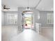 Bright foyer showcasing an open layout, recessed lighting, and large windows with plantation shutters at 2137 Blackjack Oak St, Ocoee, FL 34761