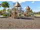 Community playground with slides and climbing equipment set on a bed of shredded rubber mulch at 2137 Blackjack Oak St, Ocoee, FL 34761