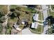 Aerial shot of the property highlighting the home's position, lot size, and proximity to neighboring houses at 2413 Spingarn Ct, Orlando, FL 32811