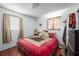 Cozy bedroom with parquet floors, natural light and a closet at 2413 Spingarn Ct, Orlando, FL 32811