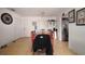 Bright dining room featuring tile floors, a large table, and modern decor elements at 2413 Spingarn Ct, Orlando, FL 32811