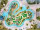 High angle of a community water park featuring lazy river, mini golf, a slide, and a pool at 2839 Bookmark Dr, Kissimmee, FL 34746