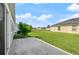 This single story home features a large grassy backyard perfect for and pets at 301 E Fiesta Key Loop, Deland, FL 32720