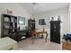 Inviting office space featuring built-in bookshelves and a classic wooden desk at 3202 Condrey Ct, The Villages, FL 32163