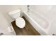 Compact bathroom with a combined toilet and bathtub and tile floors at 3230 Buck Hill Pl, Orlando, FL 32817