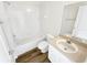 Clean bathroom with a bathtub, shower, and tile surround at 3230 Buck Hill Pl, Orlando, FL 32817