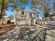 Charming two-story home with mature trees, a two-car garage and a newly installed driveway at 3230 Buck Hill Pl, Orlando, FL 32817