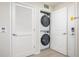 Convenient in-unit stacked washer and dryer laundry closet at 4000 Breakview Dr # C207, Orlando, FL 32819